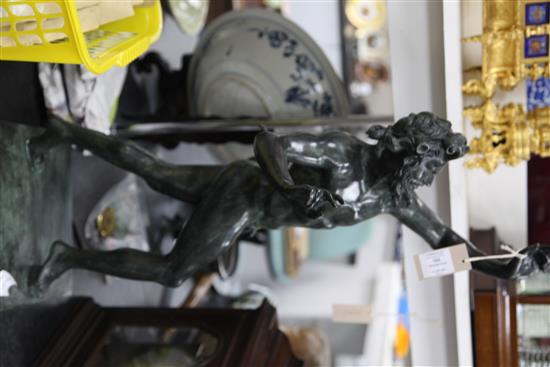 After the antique. A modern green patinated bronze model of a dancing faun, 32.5in.